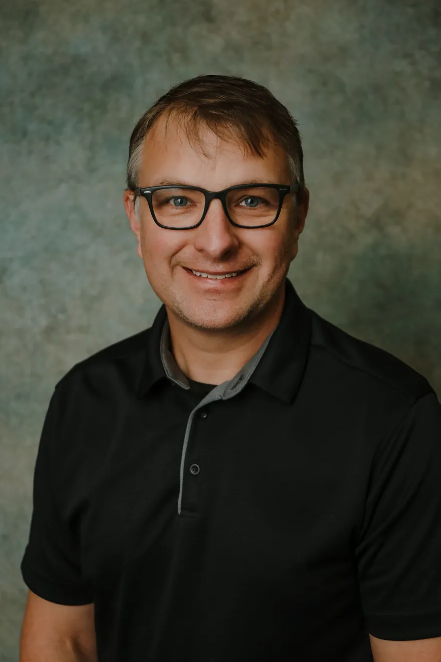 Dr. Scott Beck in professional portrait, smiling