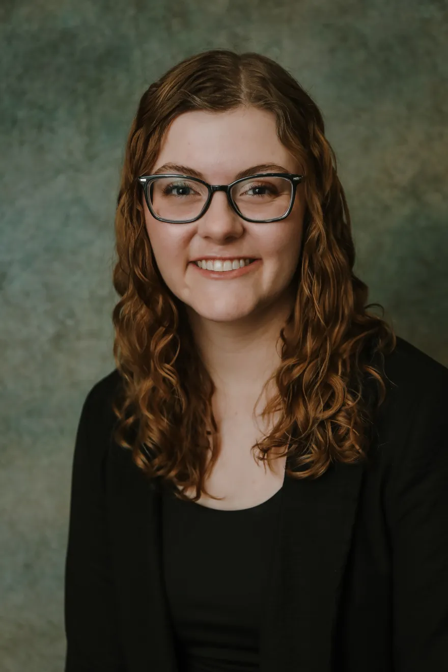 Professional portrait of Dr. Kaitlin Wasserman, smiling