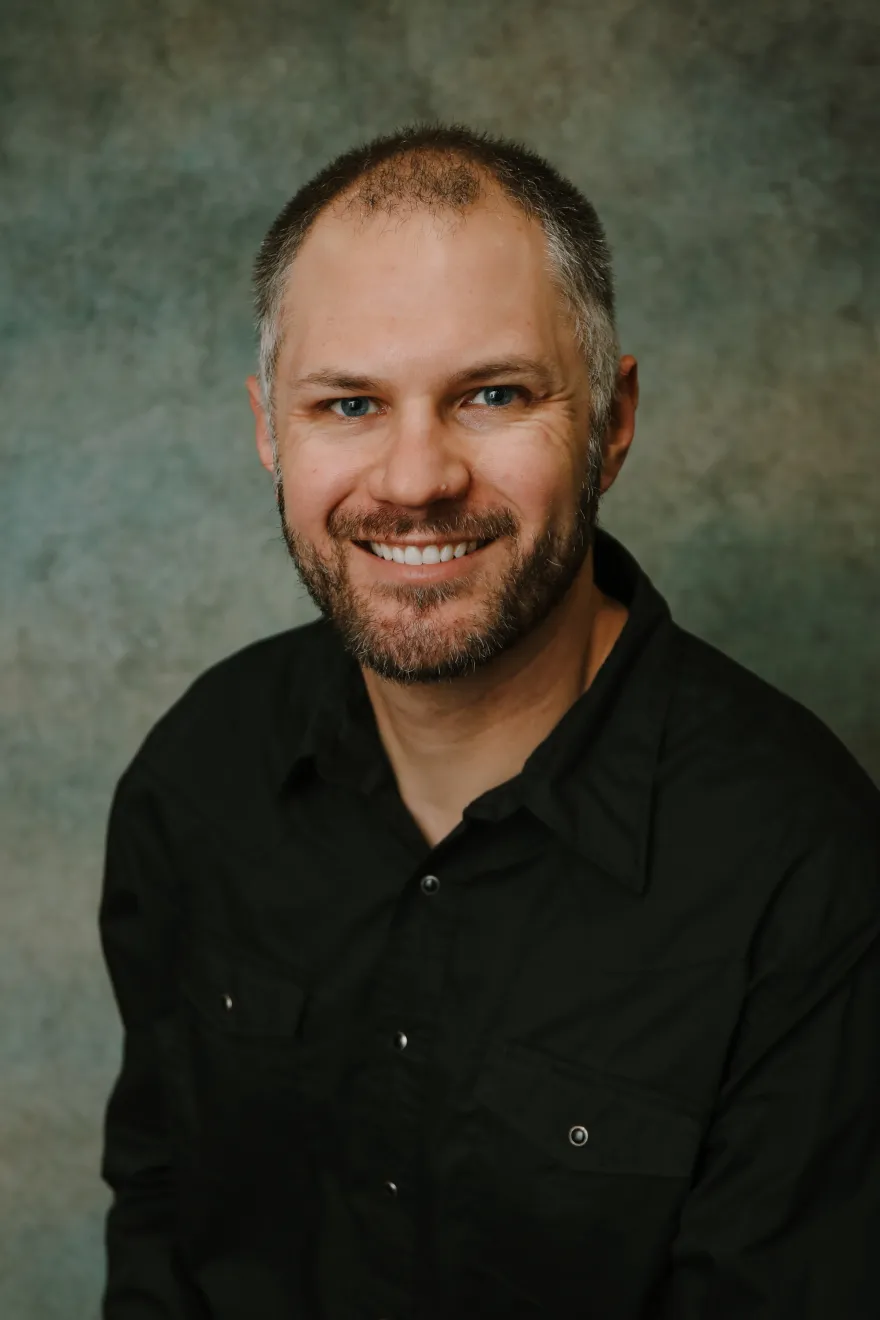 Professional portrait of Dr. Jason Zitterkopf, smiling