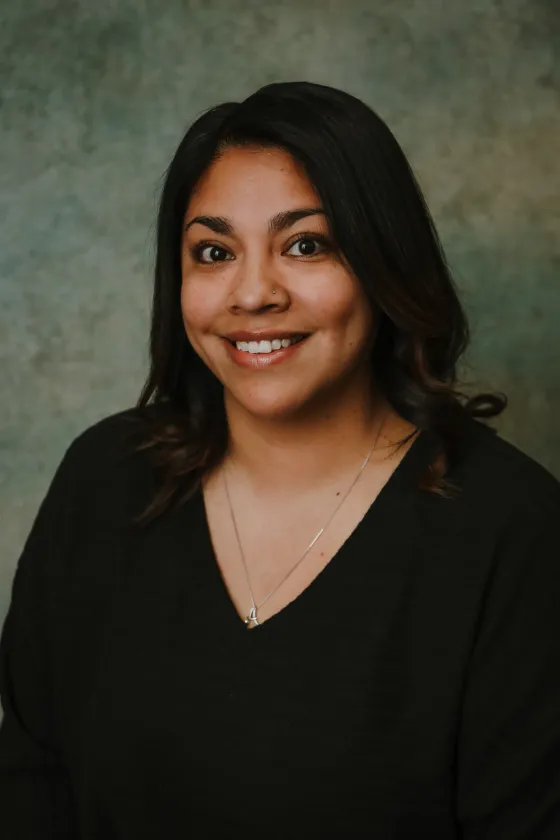Professional portrait of Ashley, smiling